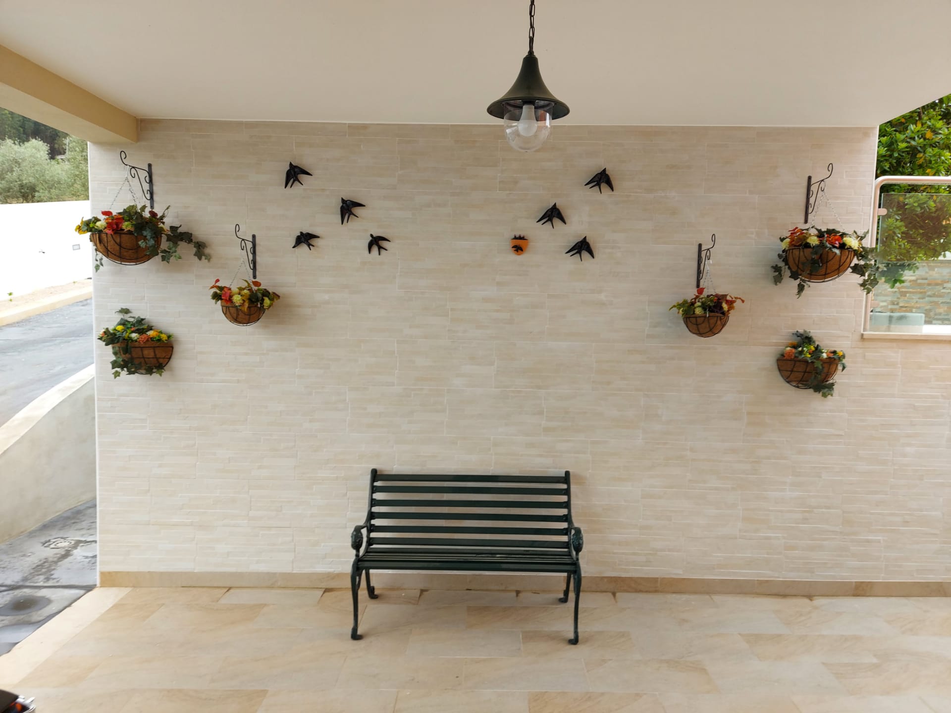 Bench under swallows wall art