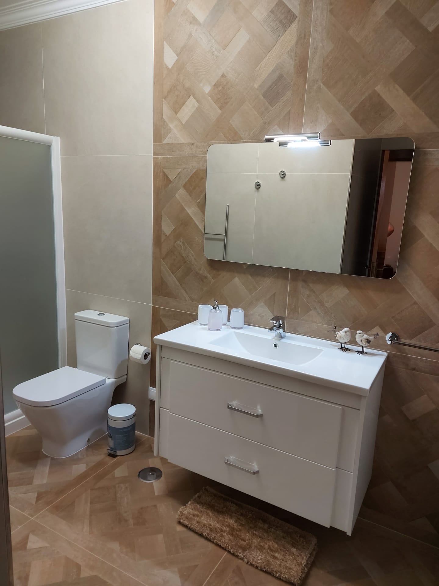 Bathroom with herringbone tile