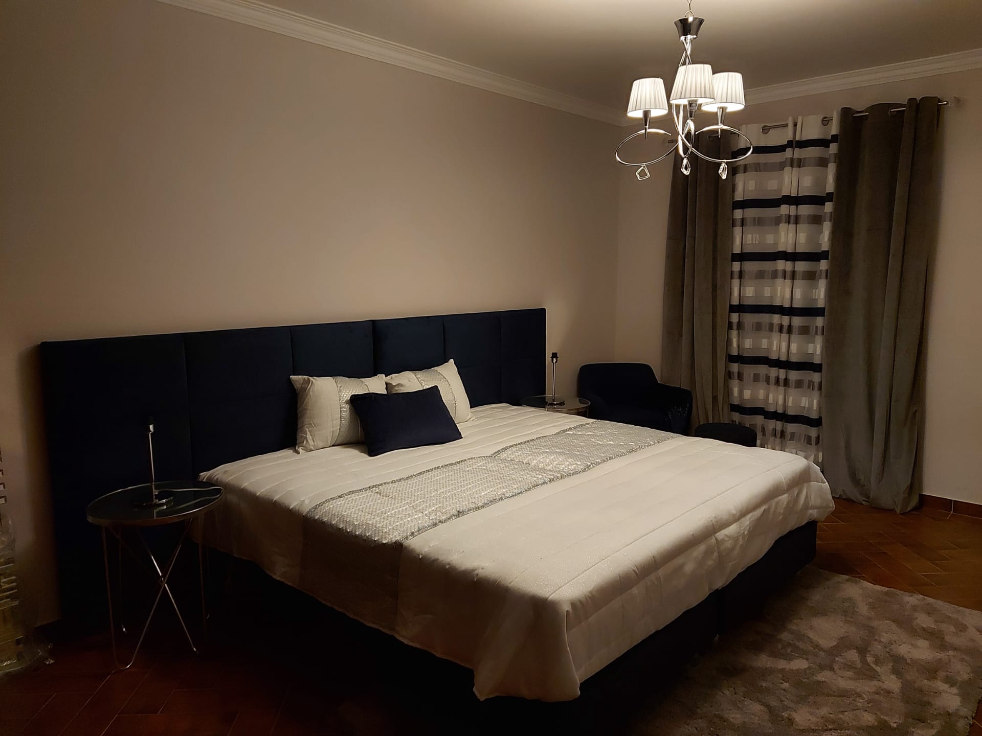 King bed in navy suite